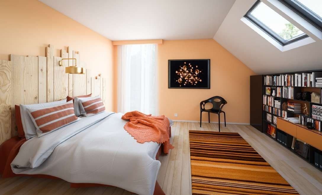 Schlafzimmer im Dachgeschoss mit Dachflächenfenster
